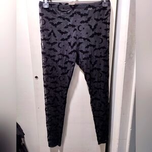Sheer mesh bat goth leggings.